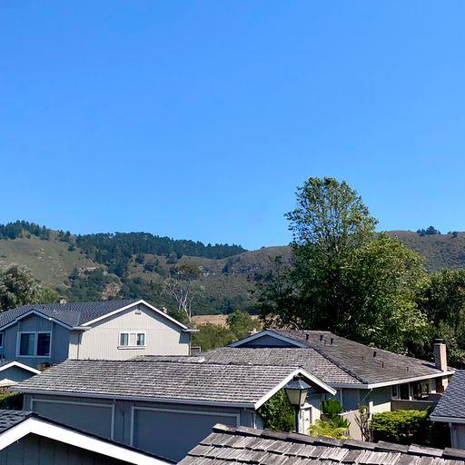 3850 Rio Road, Unit 91 Carmel, CA 93923 - Photo 28 of 31 a view of house with outdoor space and a car park