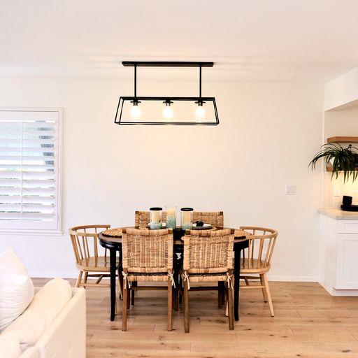 3850 Rio Road, Unit 91 Carmel, CA 93923 - Photo 9 of 31 a view of a dining room with furniture and wooden floor