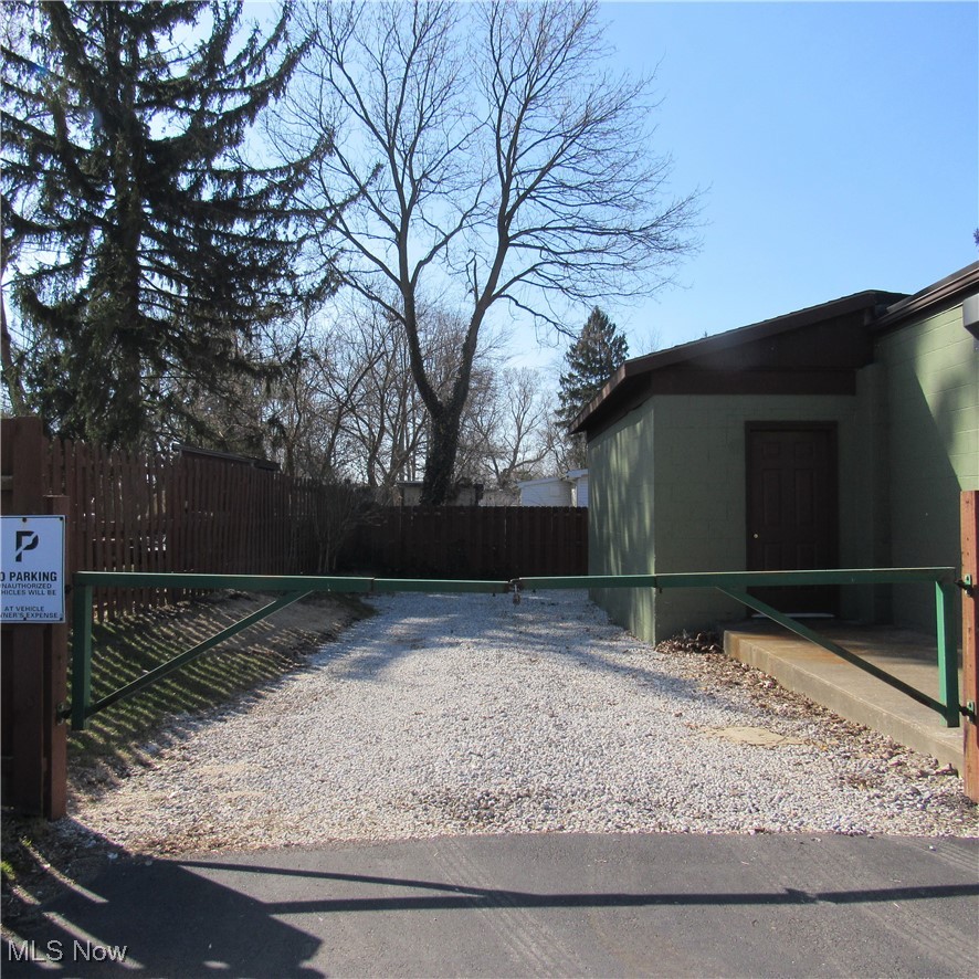 194 Killian Road Akron, OH 44319 - Photo 3 of 35 Driveway to garage, storage and loading area