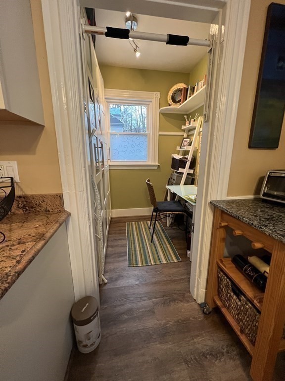 53 University Road, Unit 1 Brookline, MA 02445 - Photo 12 of 27 a view of an entryway with wooden floor