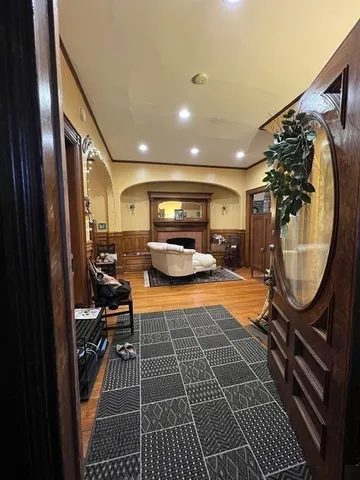 a bed room with a bed and a ceiling fan