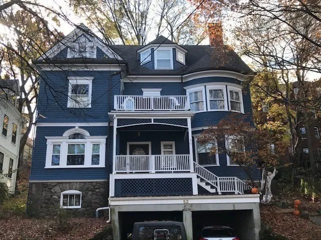a front view of residential houses
