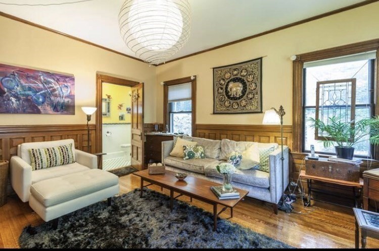 53 University Road, Unit 1 Brookline, MA 02445 - Photo 6 of 27 a living room with furniture and a window