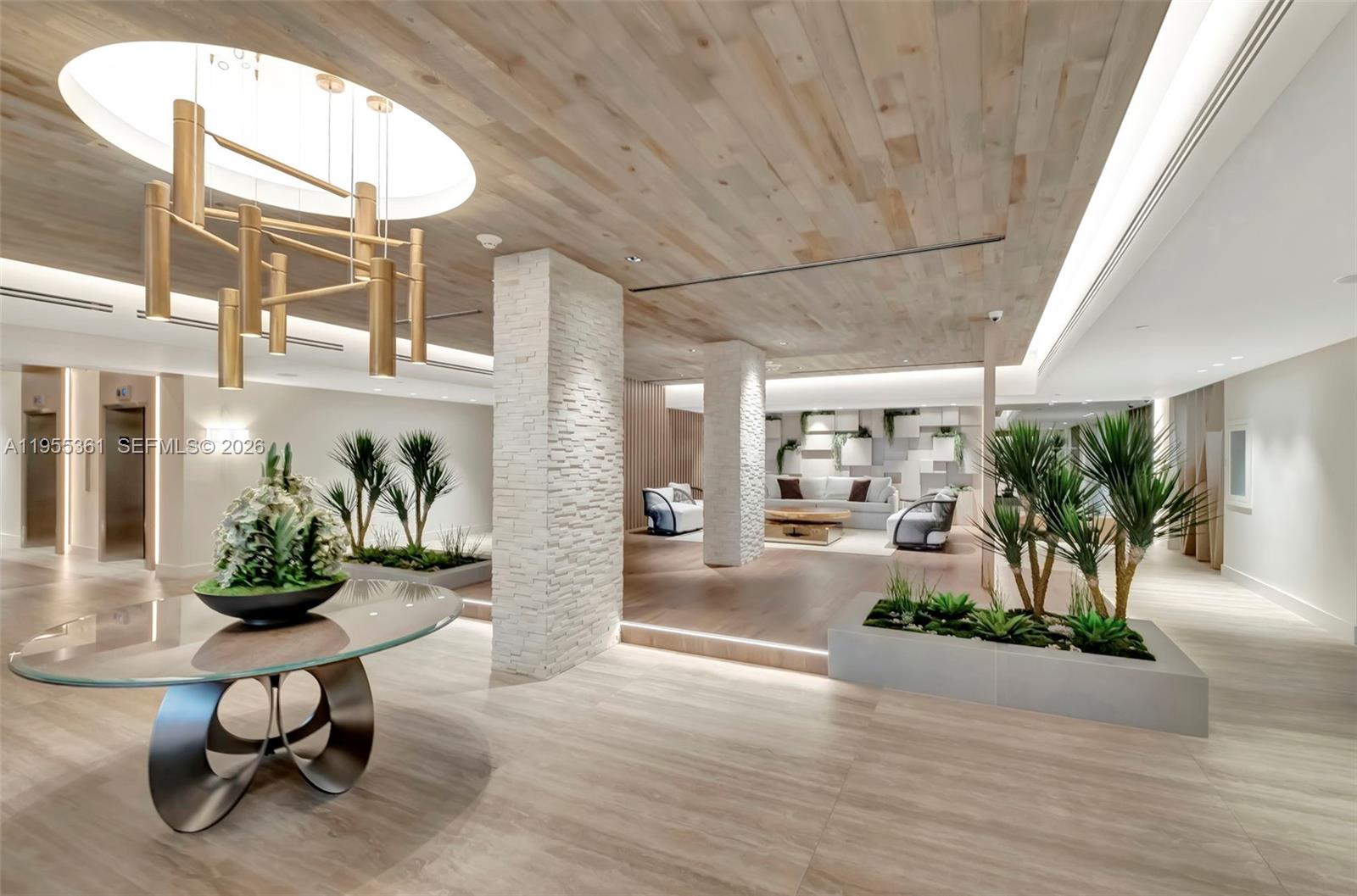 a porch with seating space and potted plants