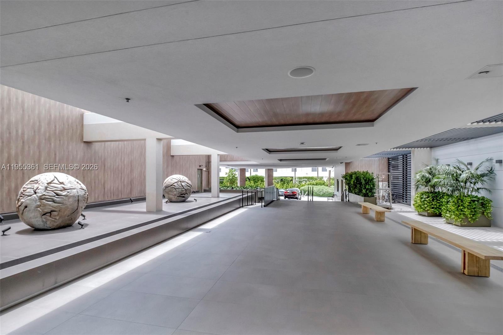 2301 Collins Avenue, Unit 321 Miami Beach, FL 33139 - Photo 2 of 16 a view of a hall way with gym equipment