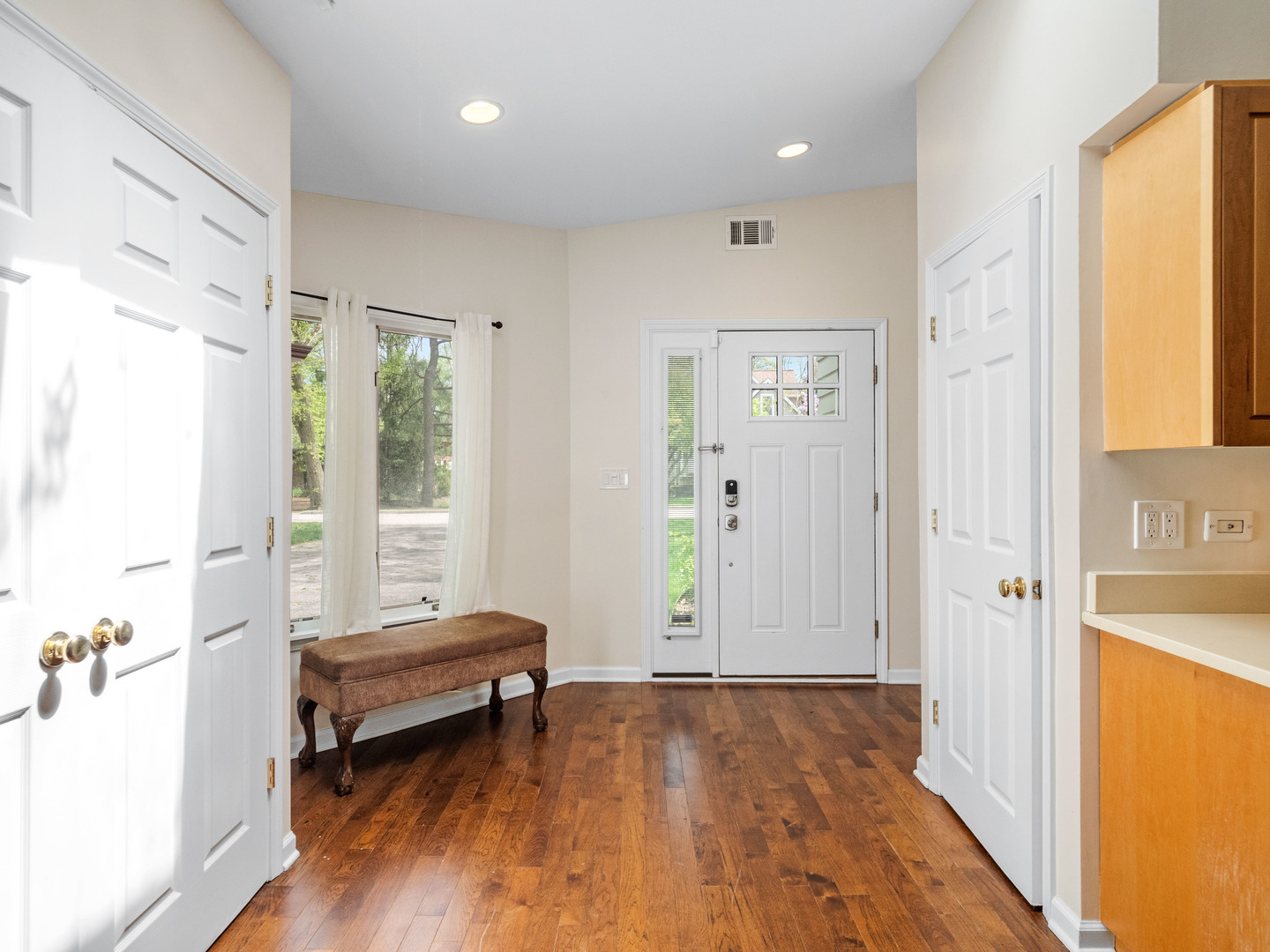 640 Hunter Road Glenview, IL 60025 - Photo 25 of 34 a living room with a bed furniture and a window