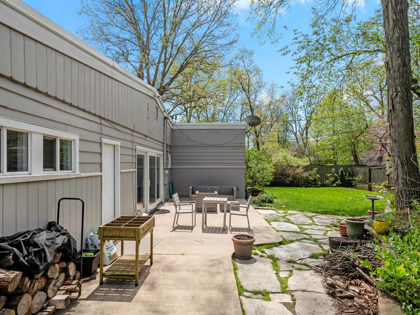 640 Hunter Road Glenview, IL 60025 - Photo 28 of 34 a view of backyard with outdoor seating and green space