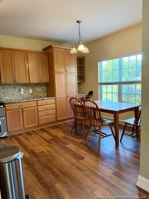 1284 L L Cooper Road Cameron, NC 28326 - Photo 6 of 24 a view of a dining room with furniture window and wooden floor