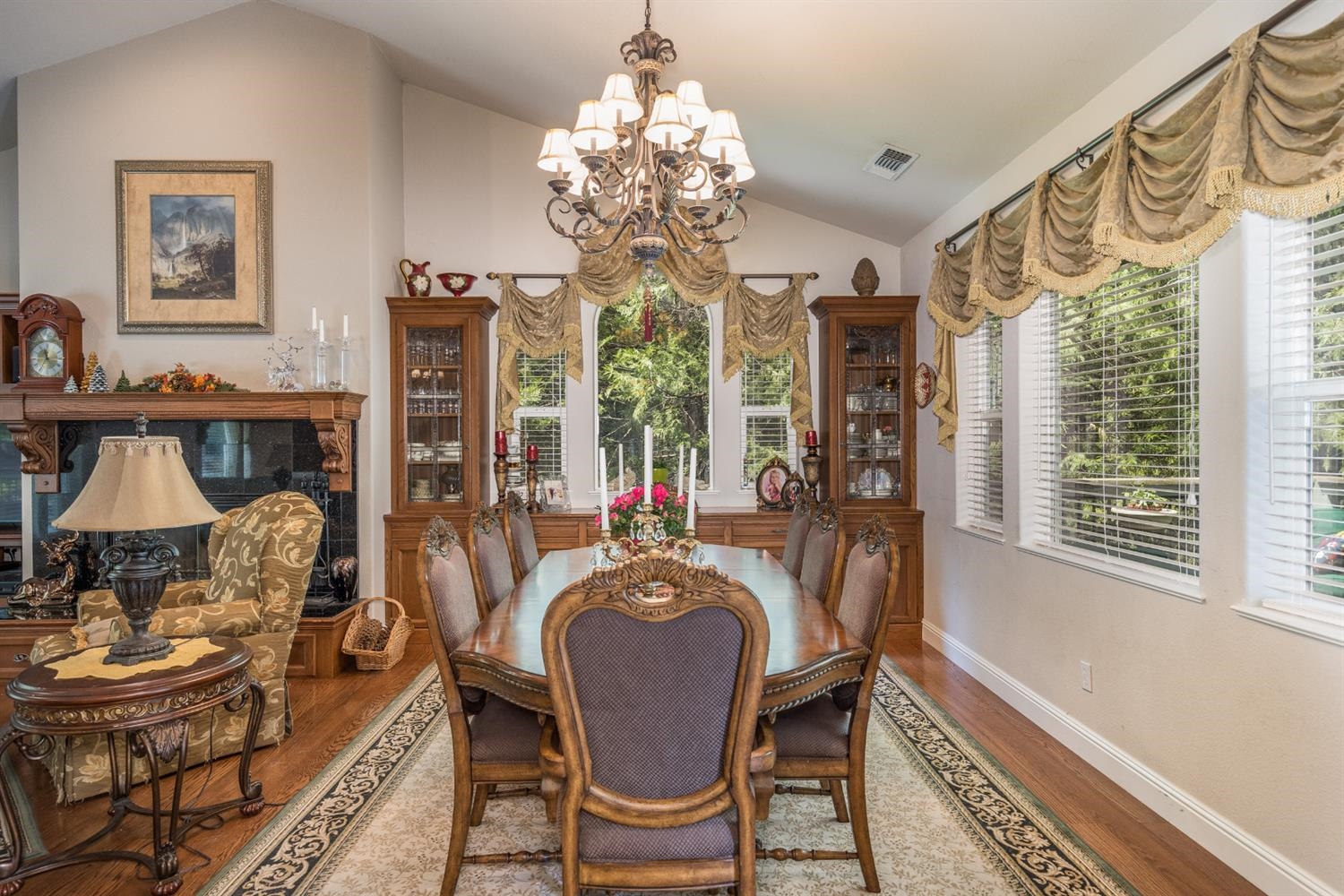 7703 Forest Drive Fish Camp, CA 93623 - Photo 12 of 48 a view of a dining room with furniture window and wooden floor