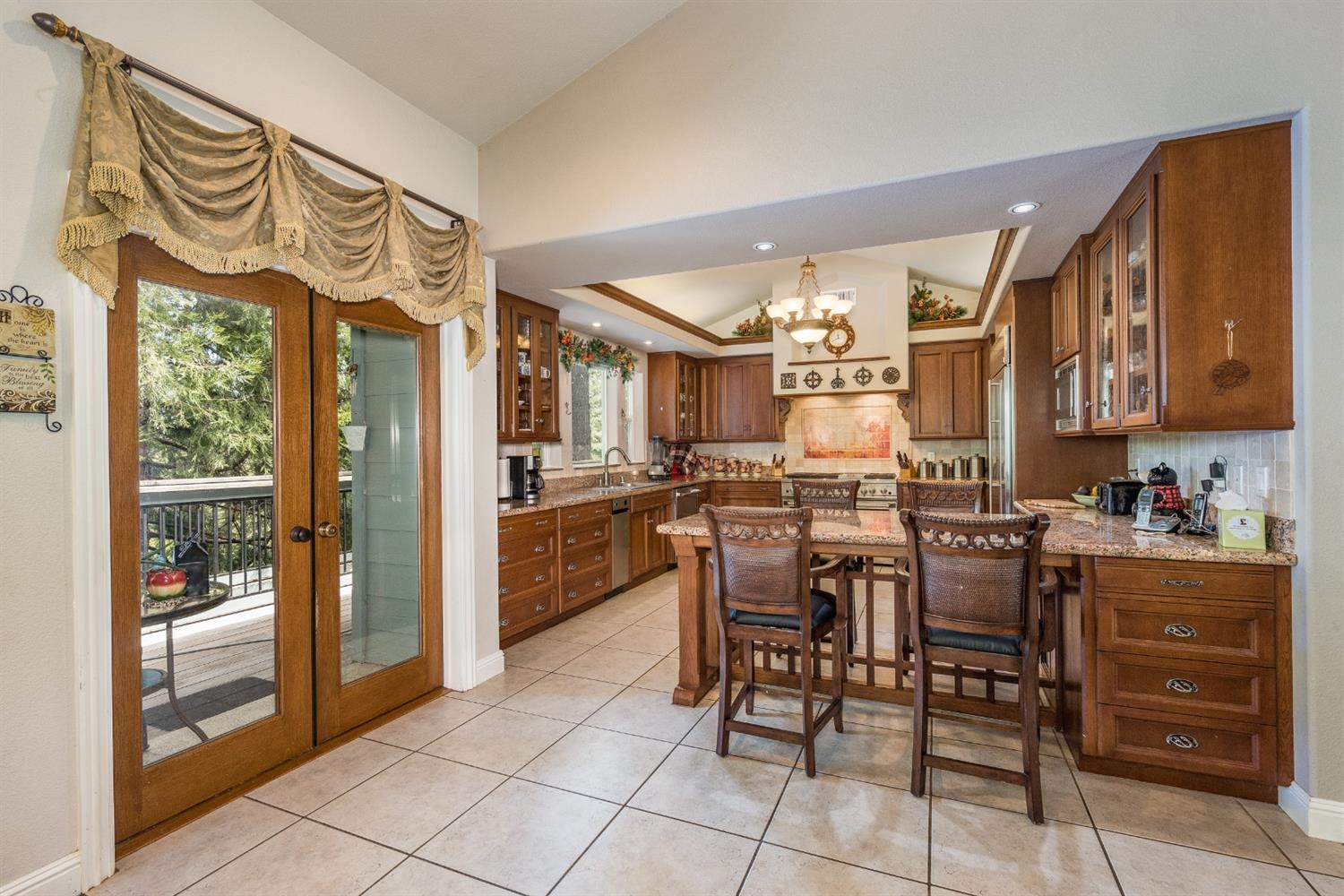 7703 Forest Drive Fish Camp, CA 93623 - Photo 13 of 48 a view of a dining room with furniture