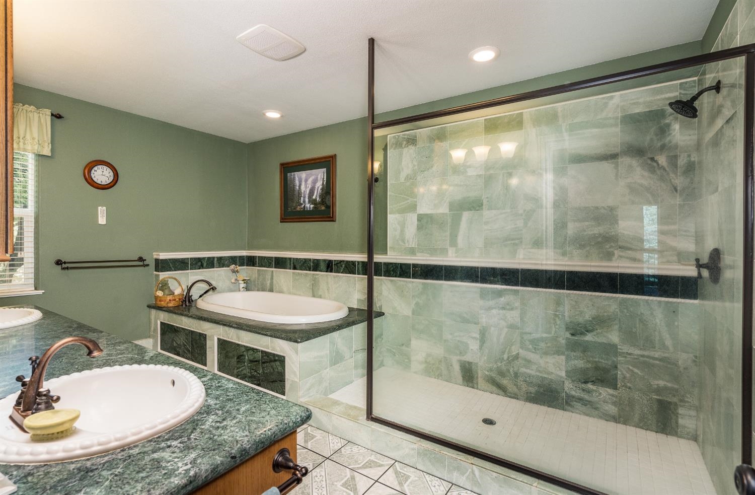 7703 Forest Drive Fish Camp, CA 93623 - Photo 35 of 48 a bathroom with a sink and a mirror