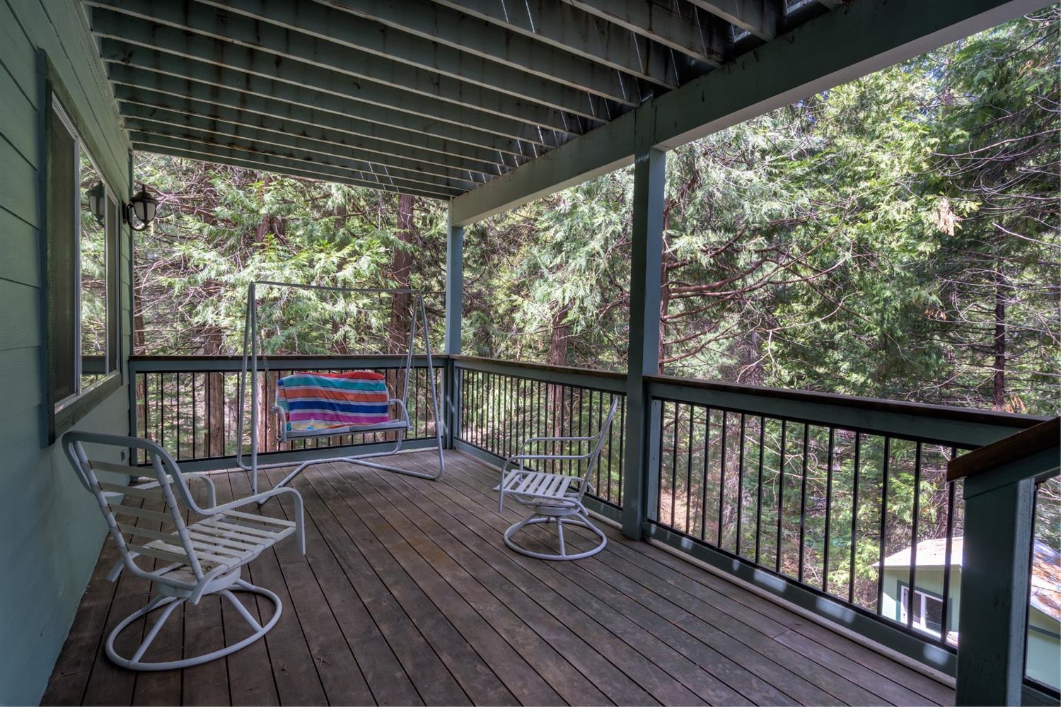7703 Forest Drive Fish Camp, CA 93623 - Photo 44 of 48 a view of a two chairs in the balcony