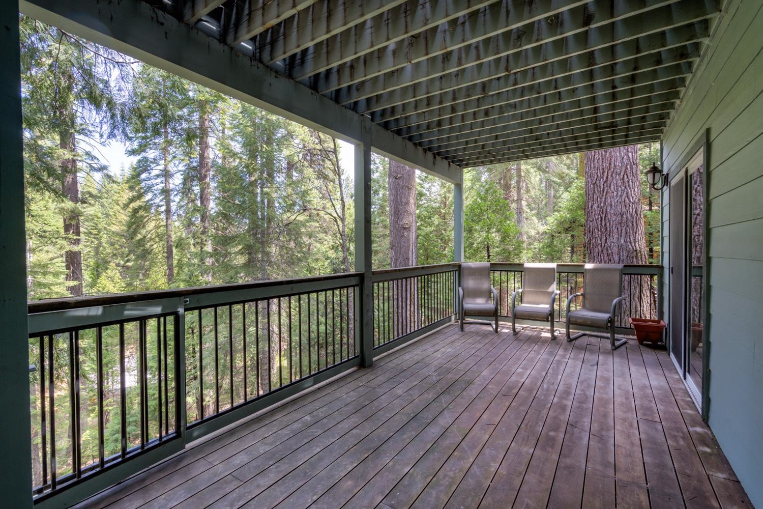 7703 Forest Drive Fish Camp, CA 93623 - Photo 45 of 48 a view of chairs in wooden deck