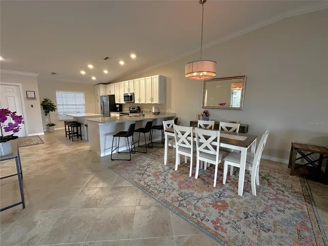 a view of a dining room with furniture