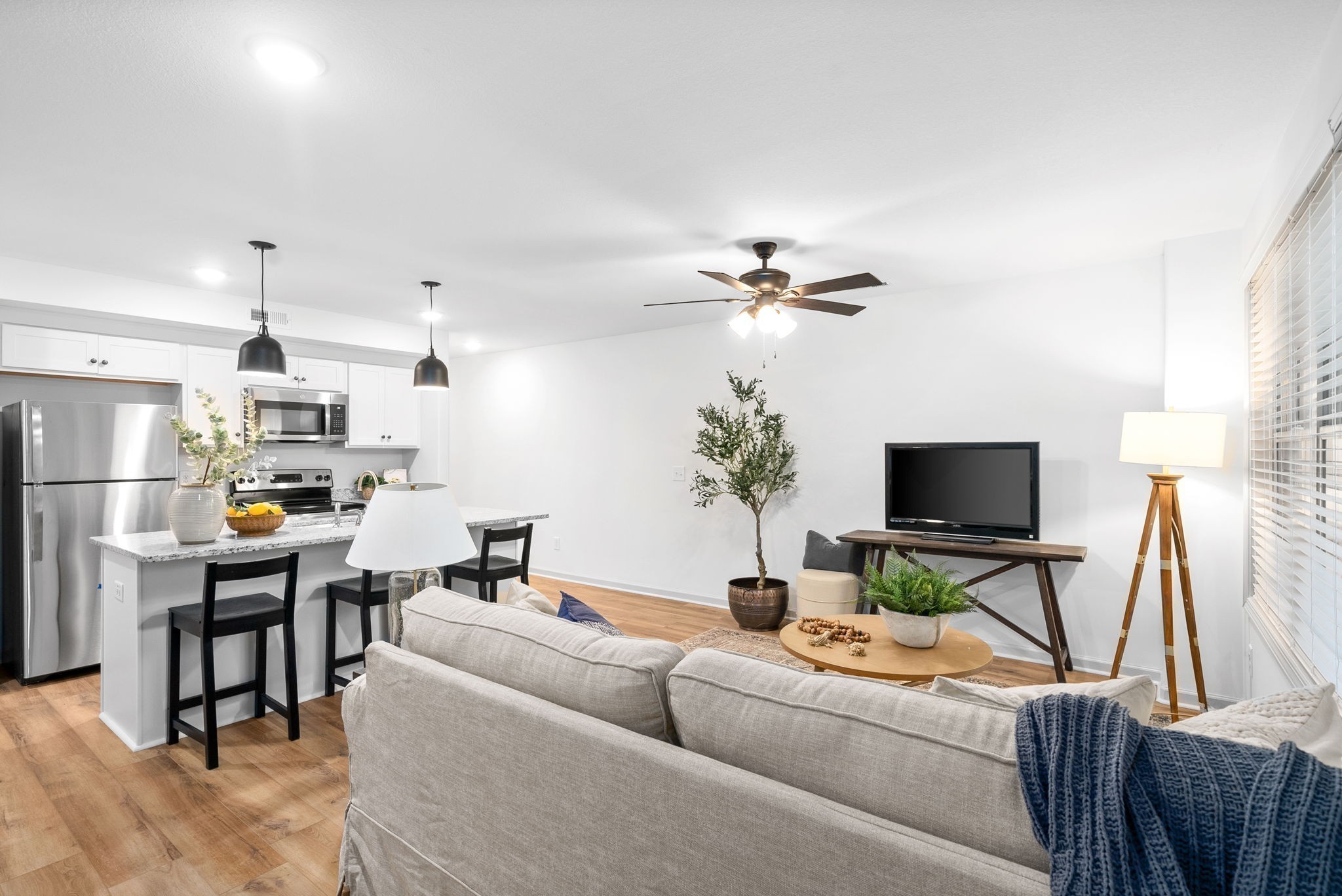 929 Center Road, Unit A Clarksville, TN 37042 - Photo 11 of 24 a living room with furniture and a flat screen tv