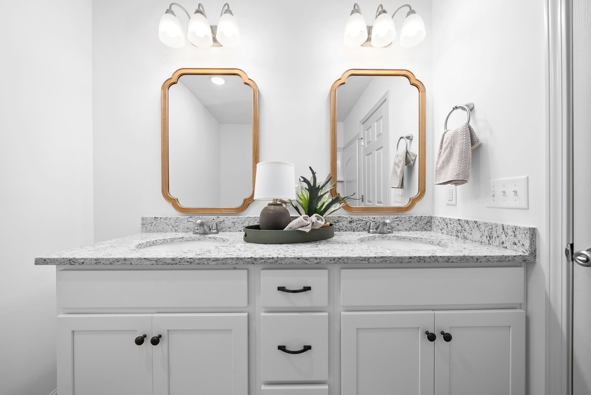 929 Center Road, Unit A Clarksville, TN 37042 - Photo 17 of 24 a bathroom with double vanity sink and mirror