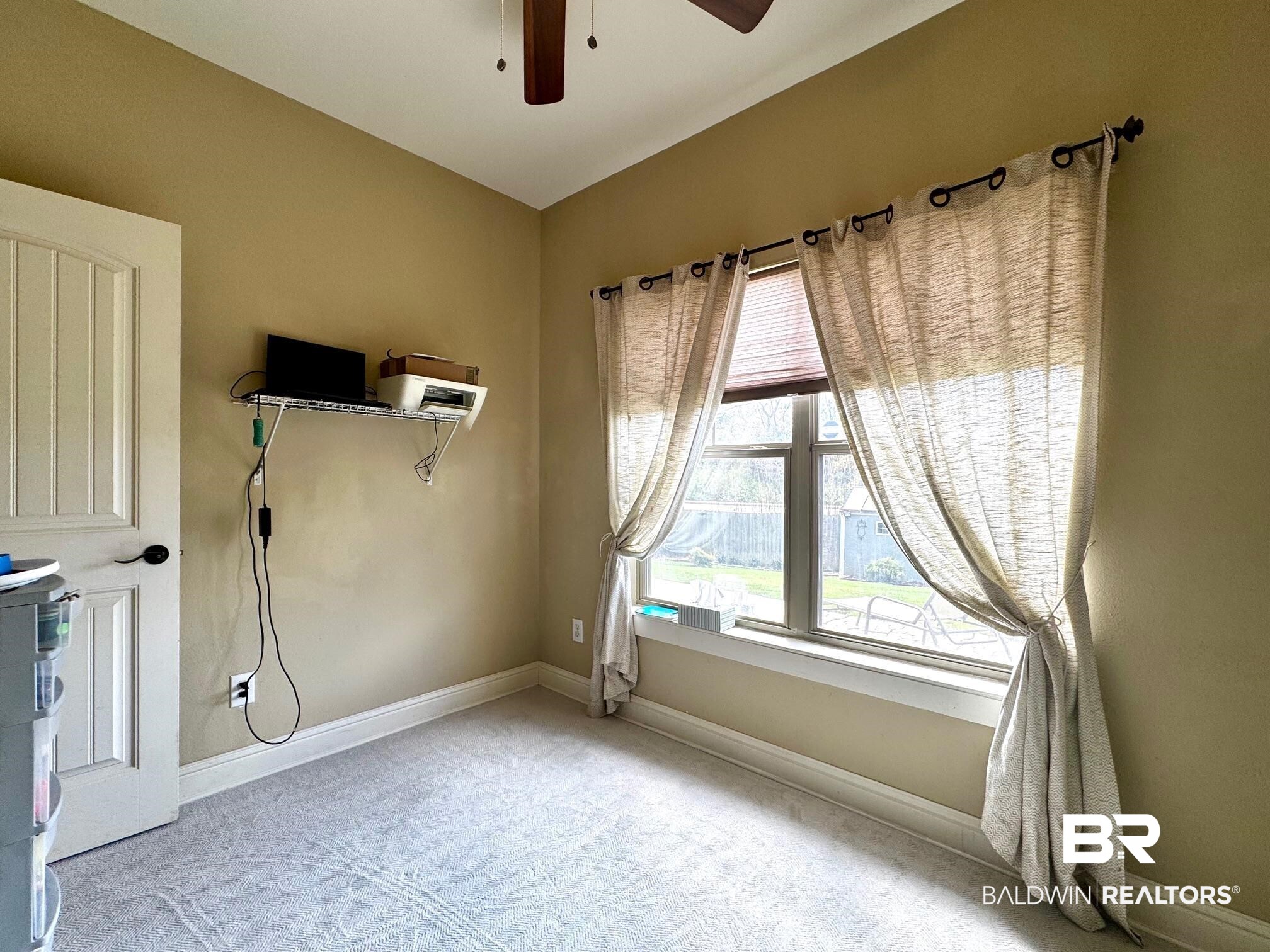 1030 Crown Walk Drive Foley, AL 36535 - Photo 28 of 40 Interior space with lofted ceiling, baseboards, carpet floors, and ceiling fan