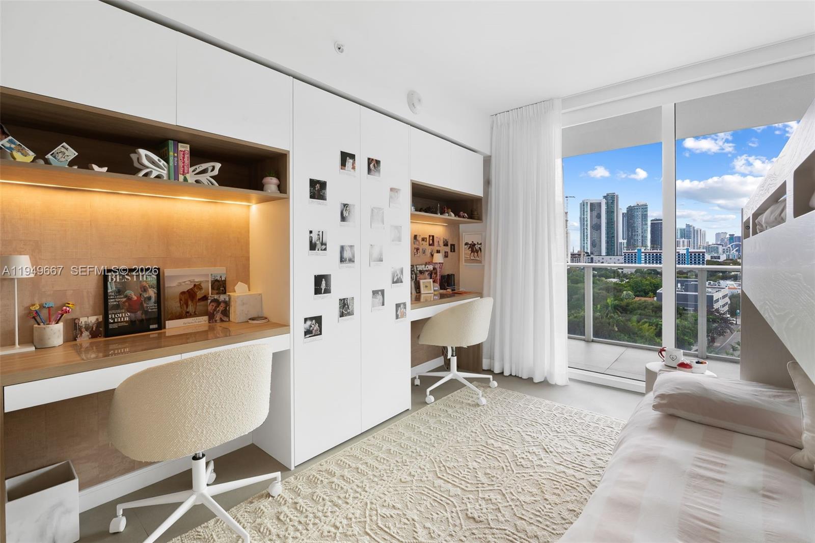 4250 Biscayne Boulevard, Unit 1201 Miami, FL 33137 - Photo 12 of 41 a very nice looking room with a large window and a couch