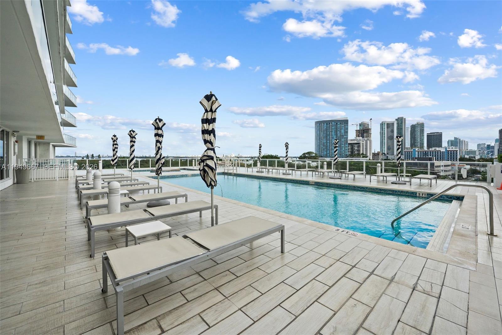4250 Biscayne Boulevard, Unit 1201 Miami, FL 33137 - Photo 30 of 41 a view of a terrace with sitting area
