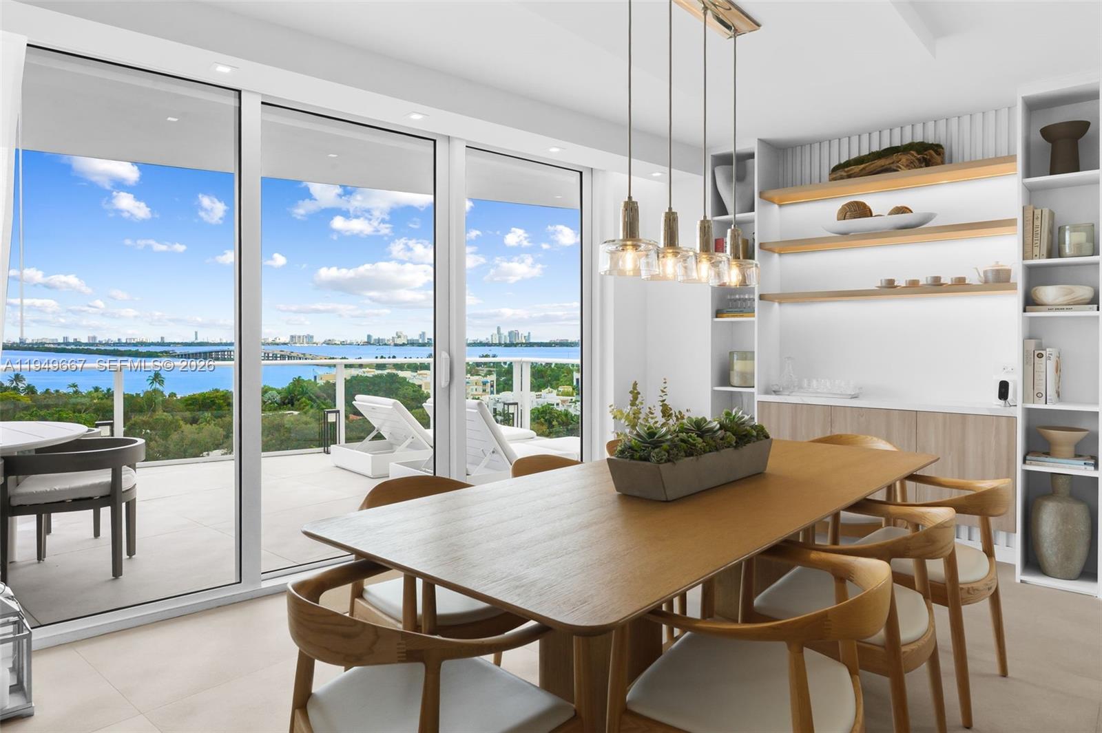 4250 Biscayne Boulevard, Unit 1201 Miami, FL 33137 - Photo 39 of 41 a view of a dining room with furniture window and outside view