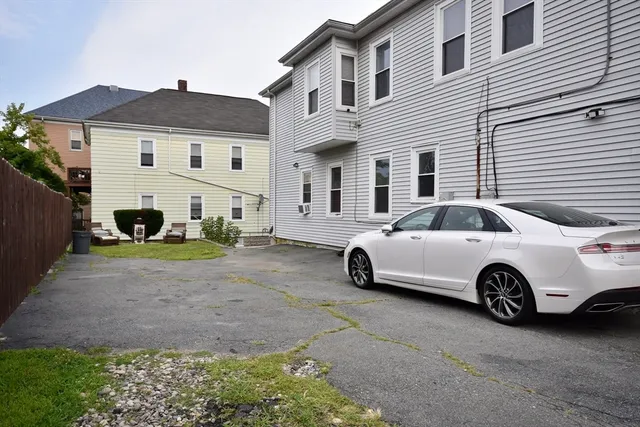 a car parked in front of a house