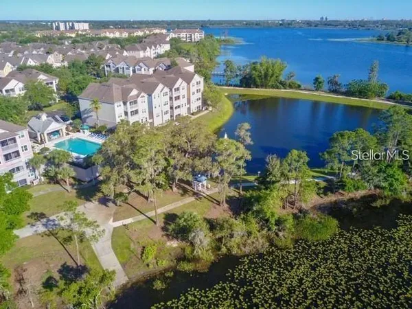 a view of a lake with a building in the background