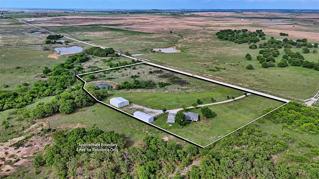 4316 Leona Road Bowie, TX 76230 - Photo 36 of 37 a view of a backyard