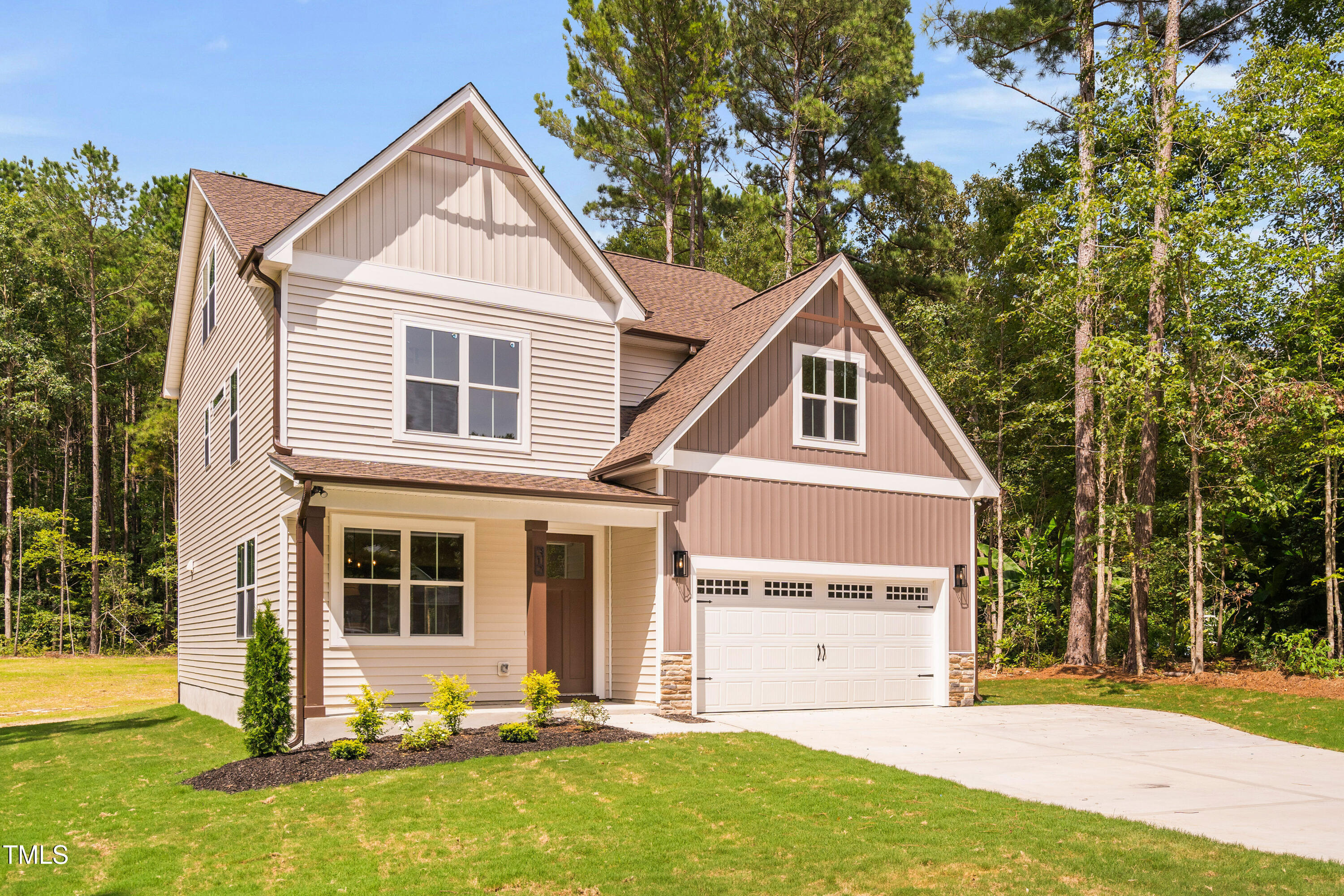 312 Russ Road Smithfield, NC 27577 - Photo 8 of 60 a front view of a house with a yard