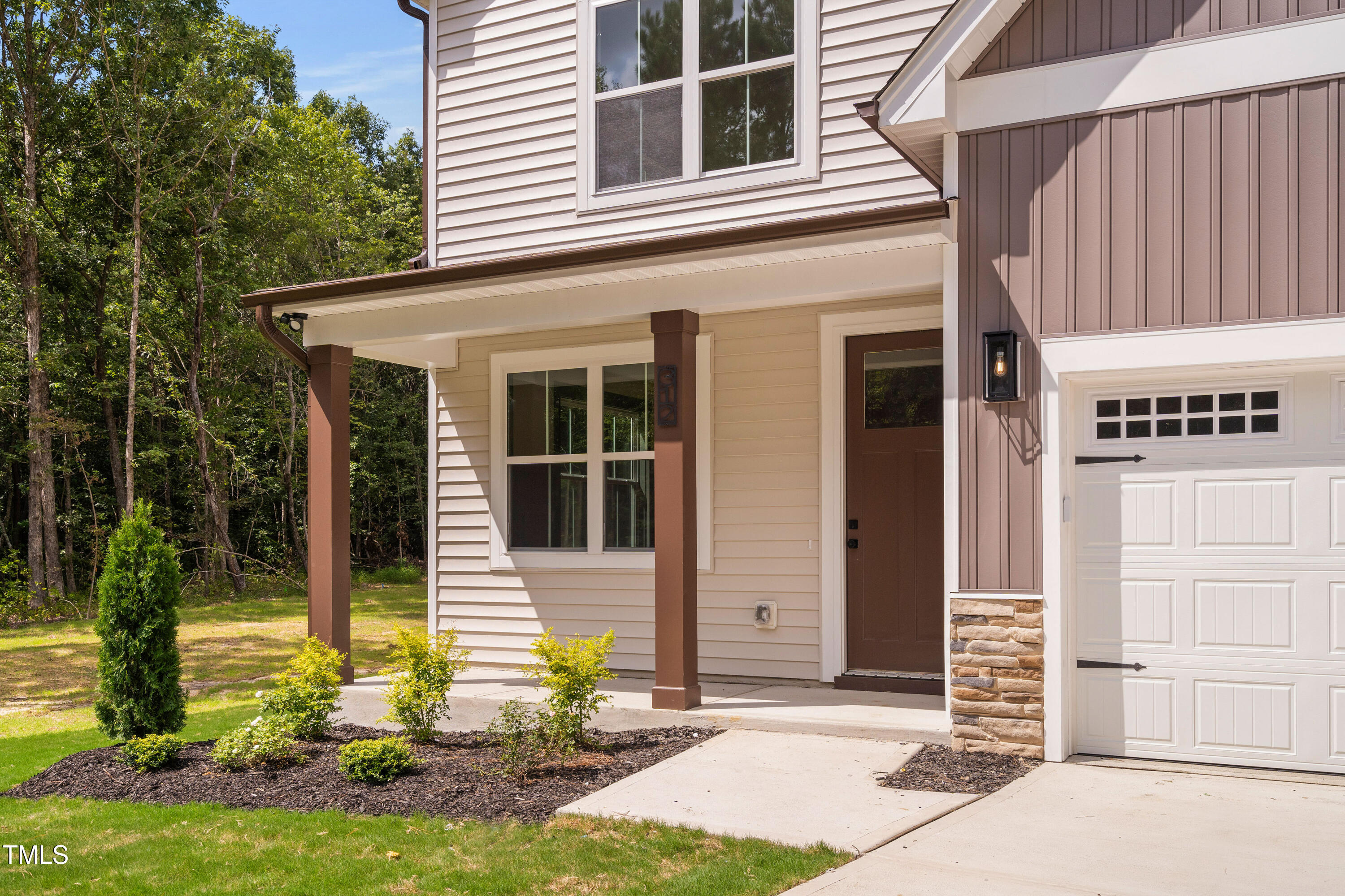 312 Russ Road Smithfield, NC 27577 - Photo 10 of 60 a front view of a house with a yard