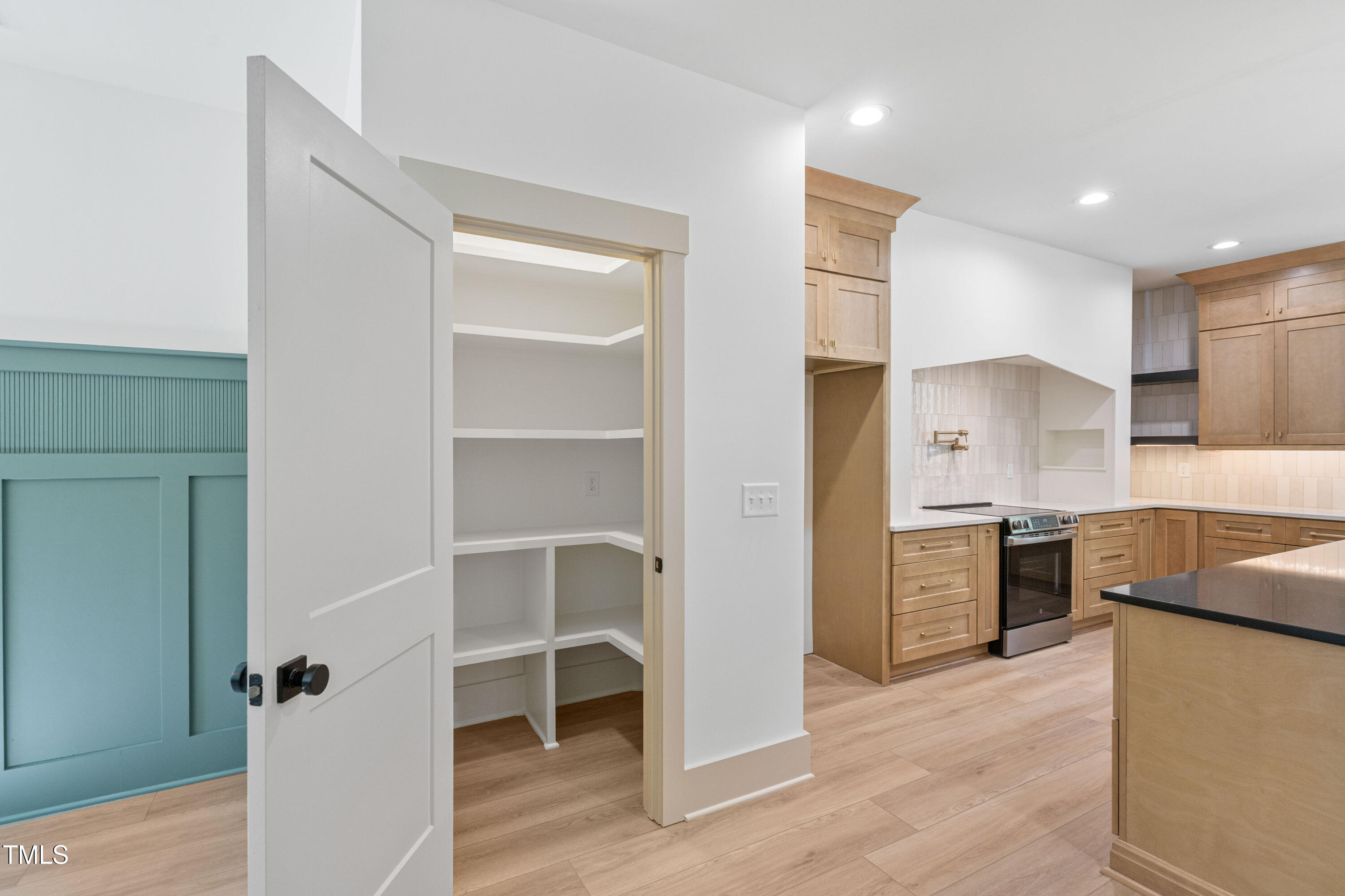312 Russ Road Smithfield, NC 27577 - Photo 20 of 60 a kitchen with a refrigerator and a sink
