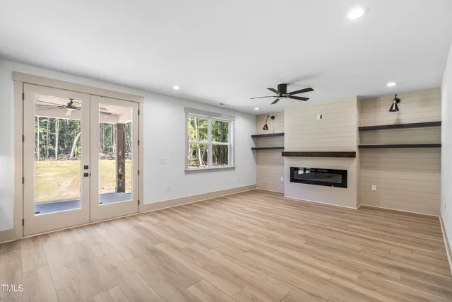 a bathroom with a toilet a sink and a mirror