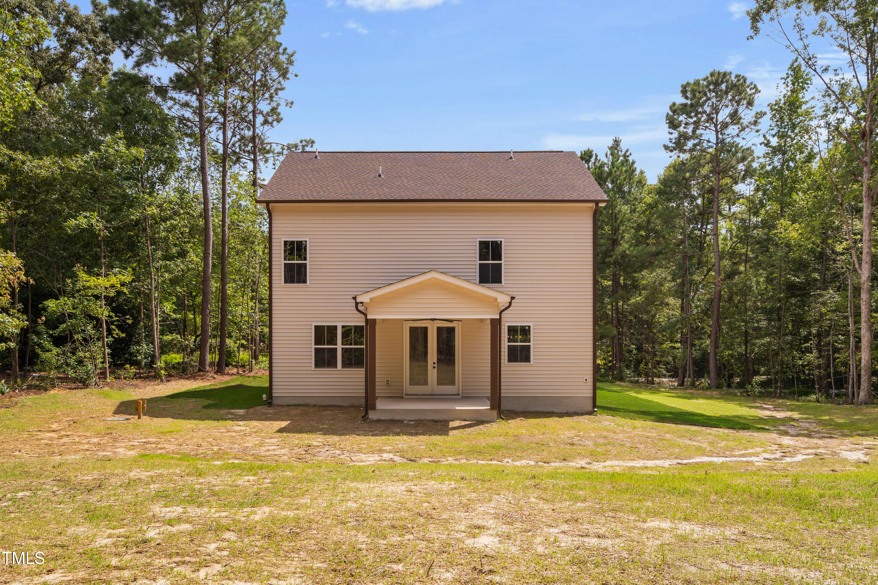312 Russ Road Smithfield, NC 27577 - Photo 48 of 60 a front view of a house with a yard