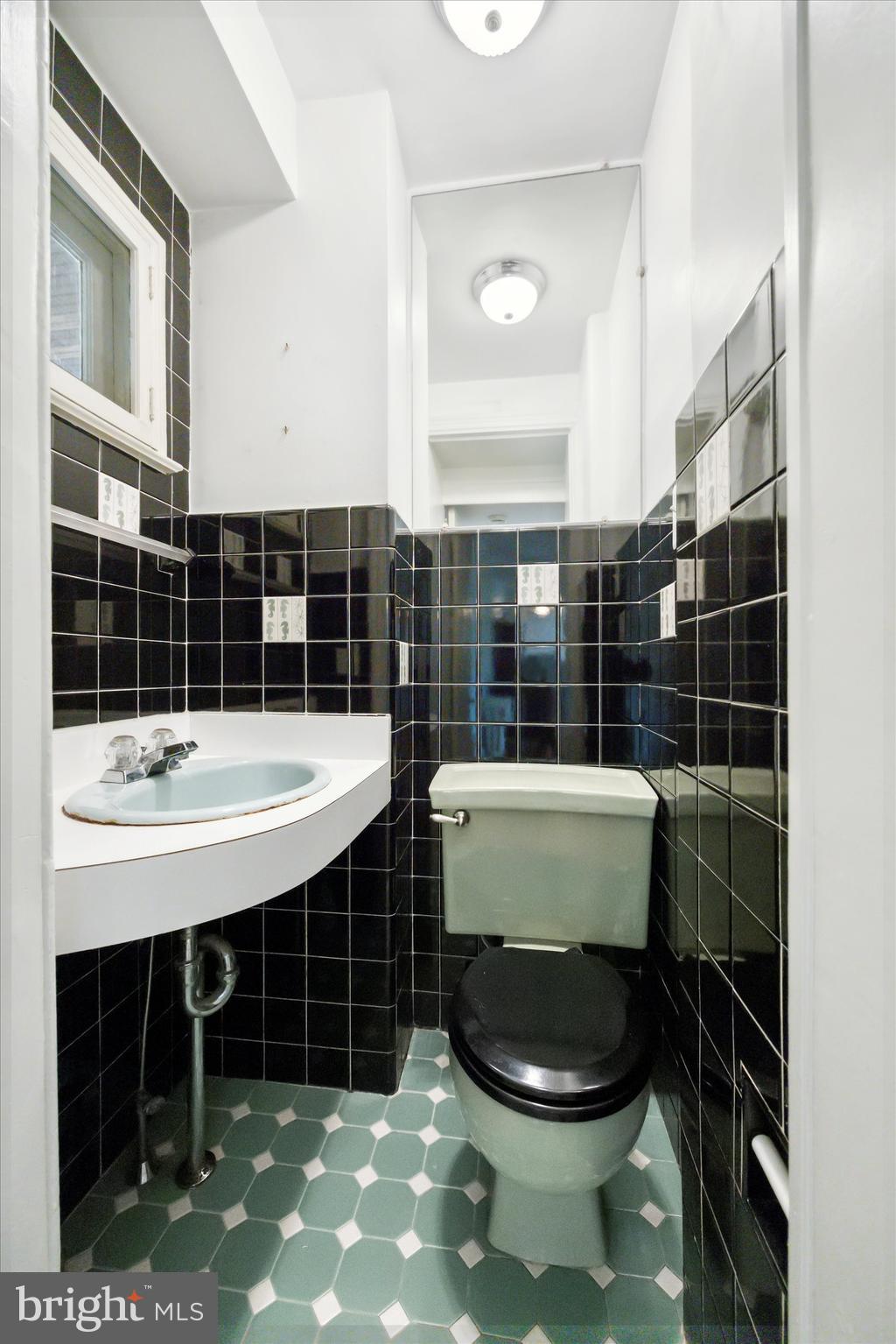 2314 Valley Road Huntingdon Valley, PA 19006 - Photo 28 of 62 a bathroom with a sink a toilet and shower