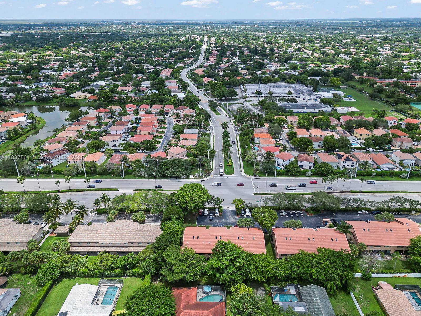 10942 West Sample Road, Unit E1 Coral Springs, FL 33065 - Photo 29 of 32 an aerial view of multiple house