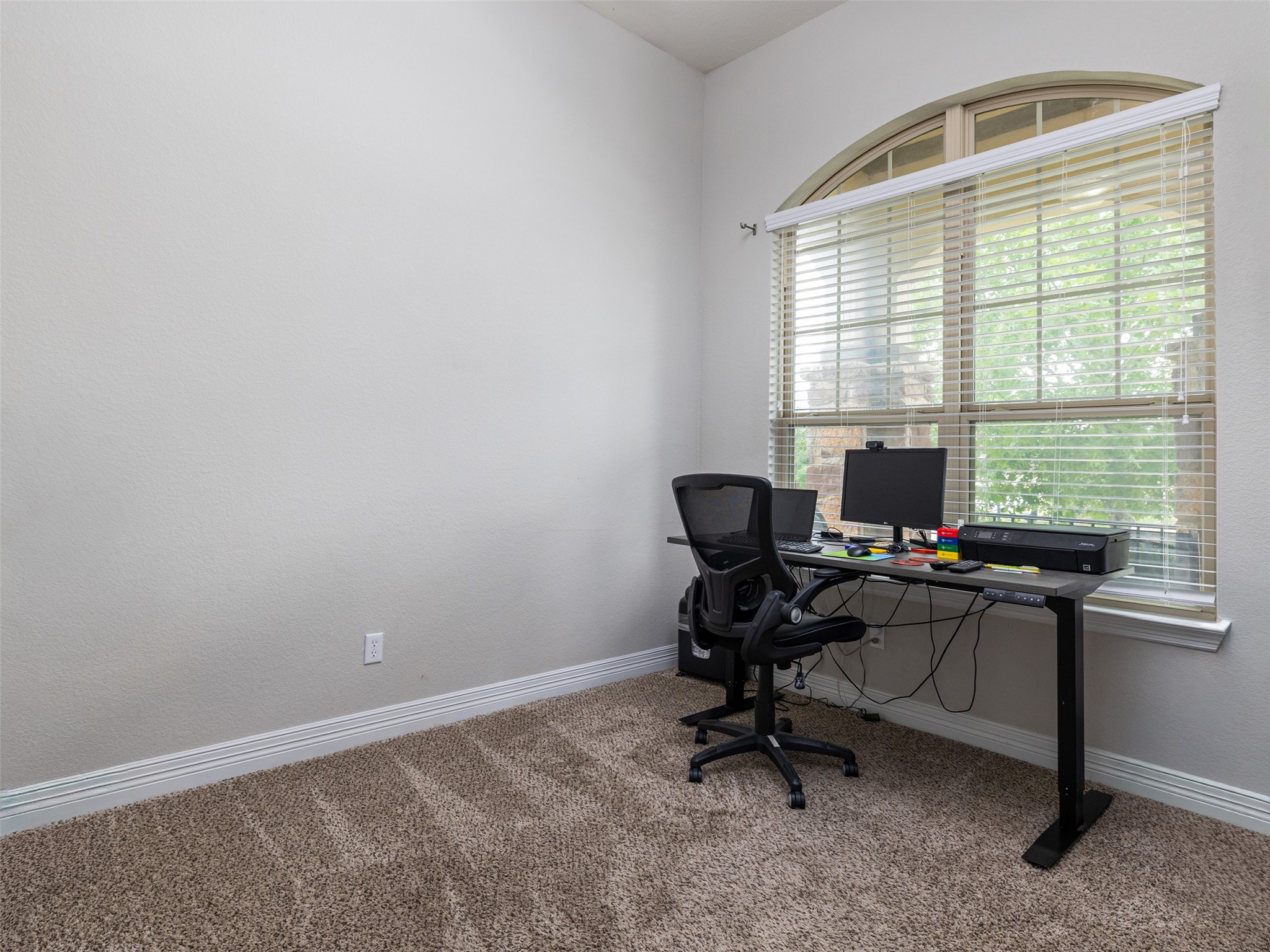 717 Blue Agave Lane Georgetown, TX 78626 - Photo 17 of 28 a view of a workspace with a window