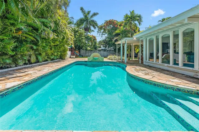 a view of a backyard with a garden