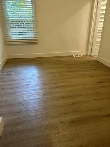 a view of a hallway with elevator