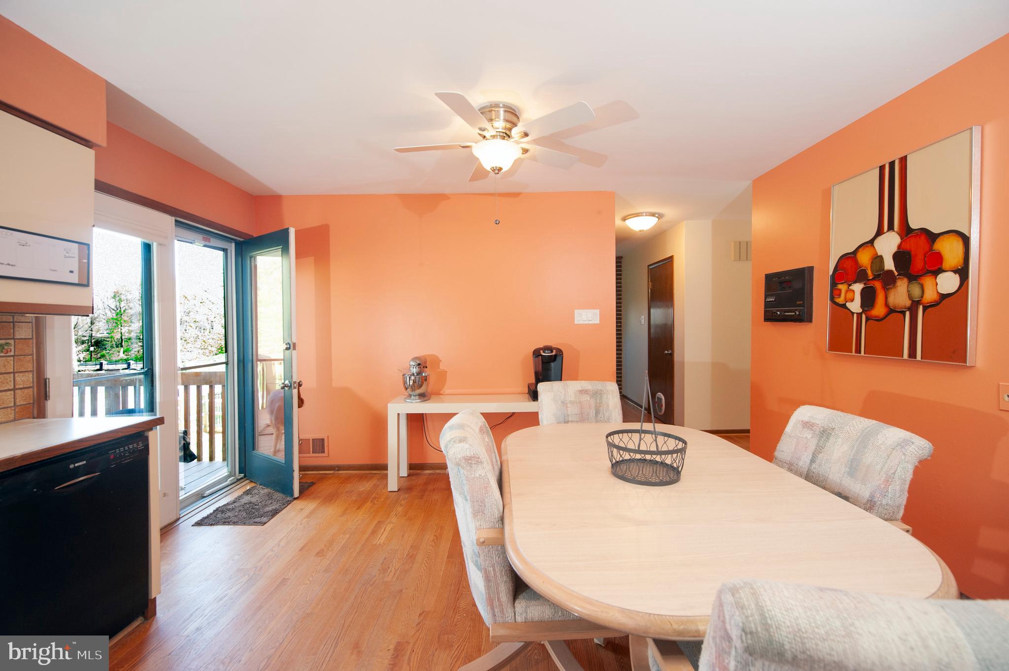 513 Flora Circle Springfield, PA 19064 - Photo 8 of 28 a dining room with furniture and wooden floor