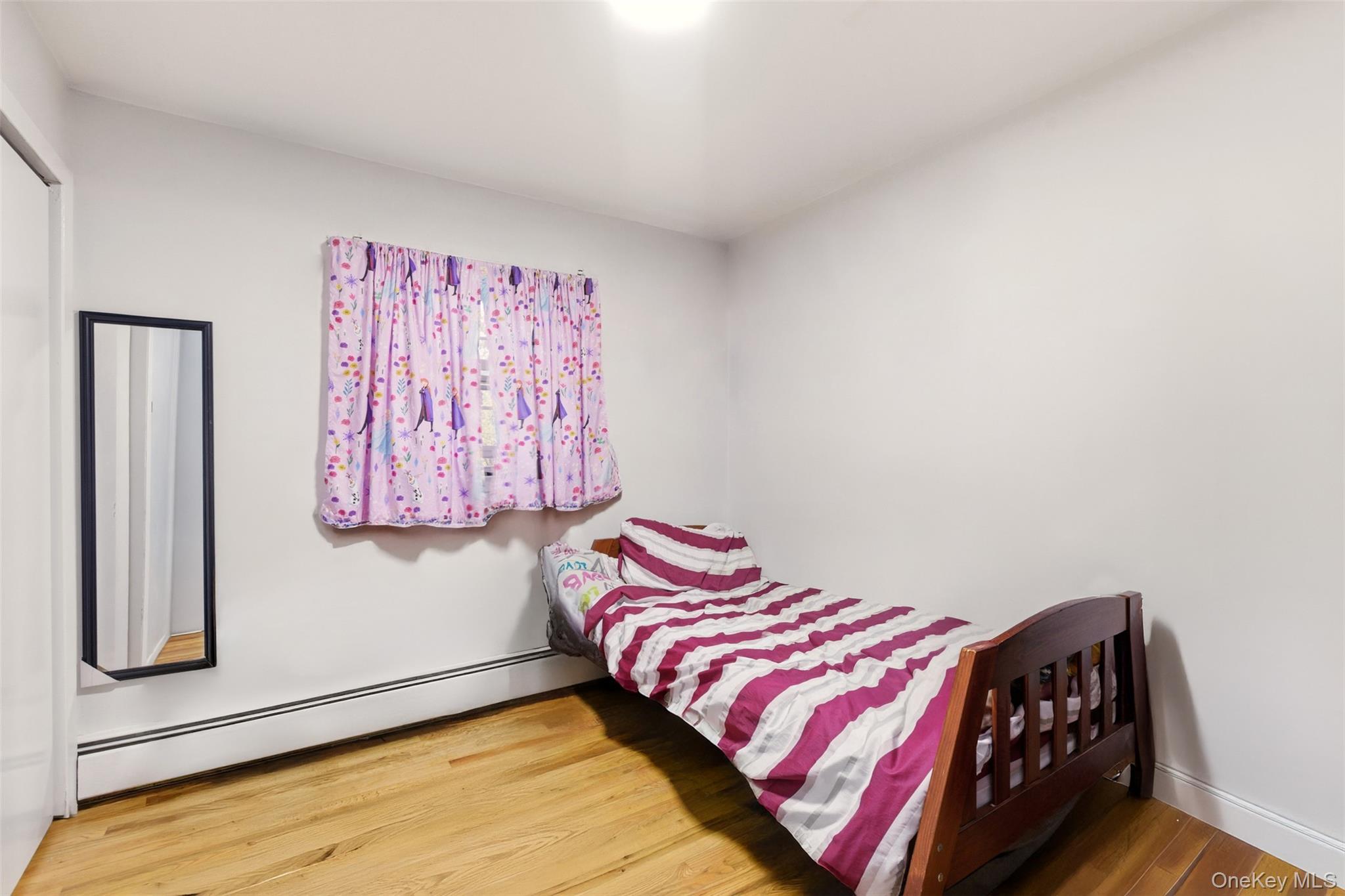 7 Jacqueline Road Monsey, NY 10952 - Photo 14 of 19 a bedroom with a bed and a window