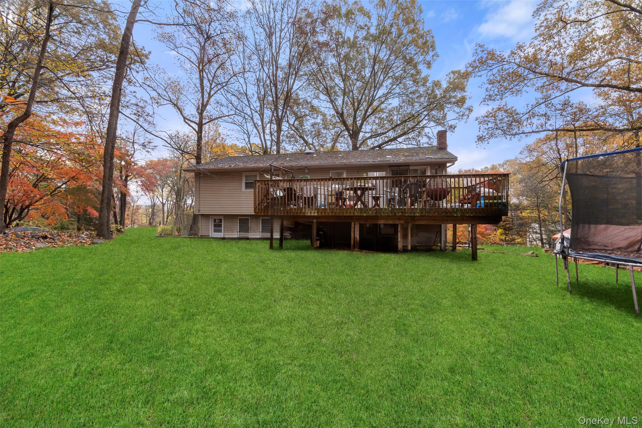 7 Jacqueline Road Monsey, NY 10952 - Photo 15 of 19 a view of a house with backyard and sitting area