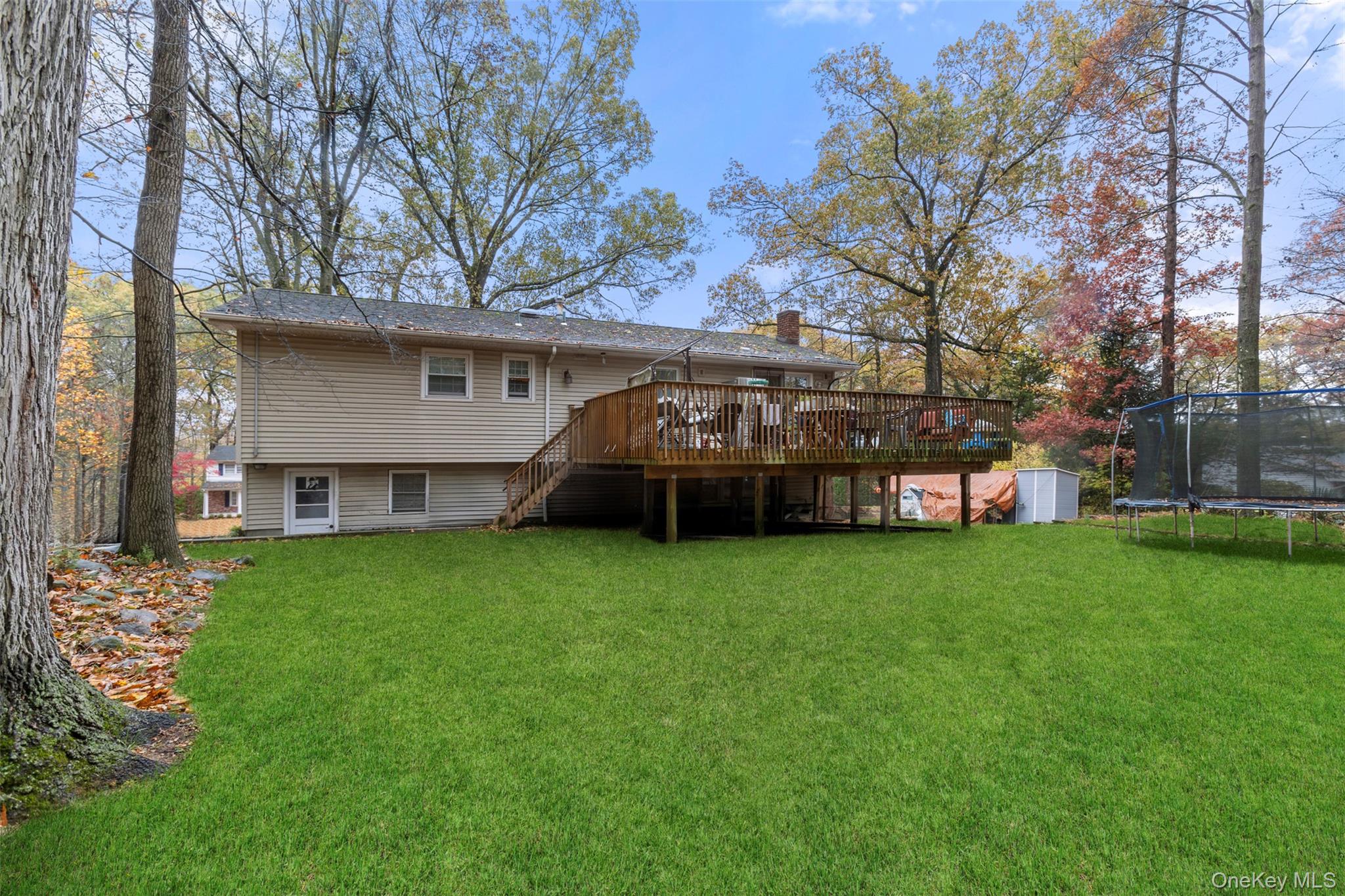7 Jacqueline Road Monsey, NY 10952 - Photo 16 of 19 a view of a house with a back yard
