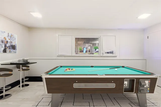 a room with furniture and window