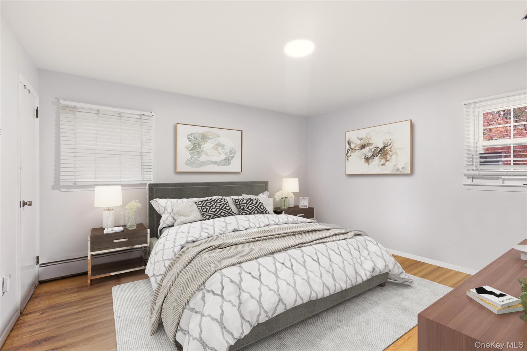 7 Jacqueline Road Monsey, NY 10952 - Photo 9 of 19 a bedroom with a bed and wooden floor