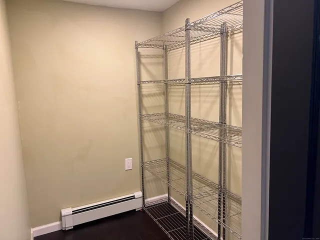 a bathroom with a glass shower door