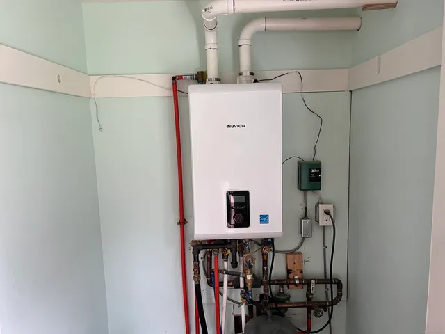 a view of storage and utility room with two washing machine