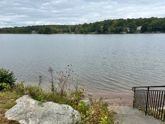a view of lake with mountain in background