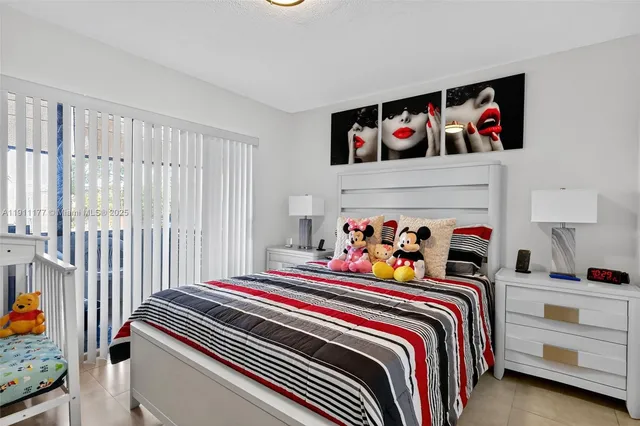 a bed room with a bed and a couch