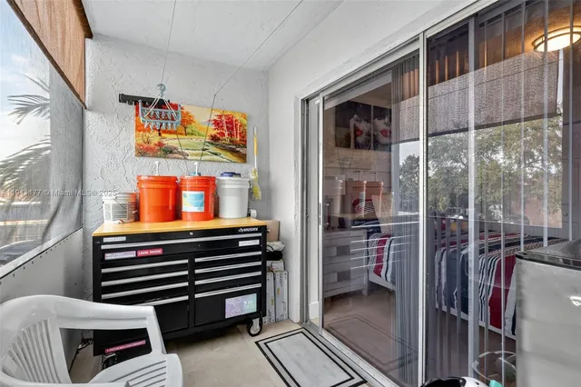 a room with furniture and a window