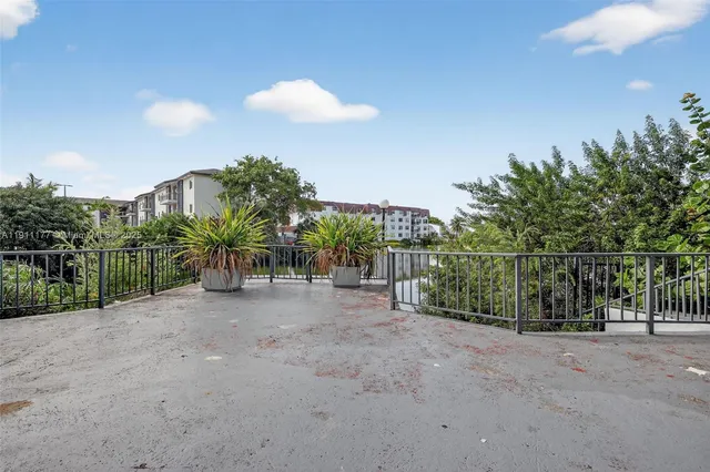 a view of a car park in front of a building