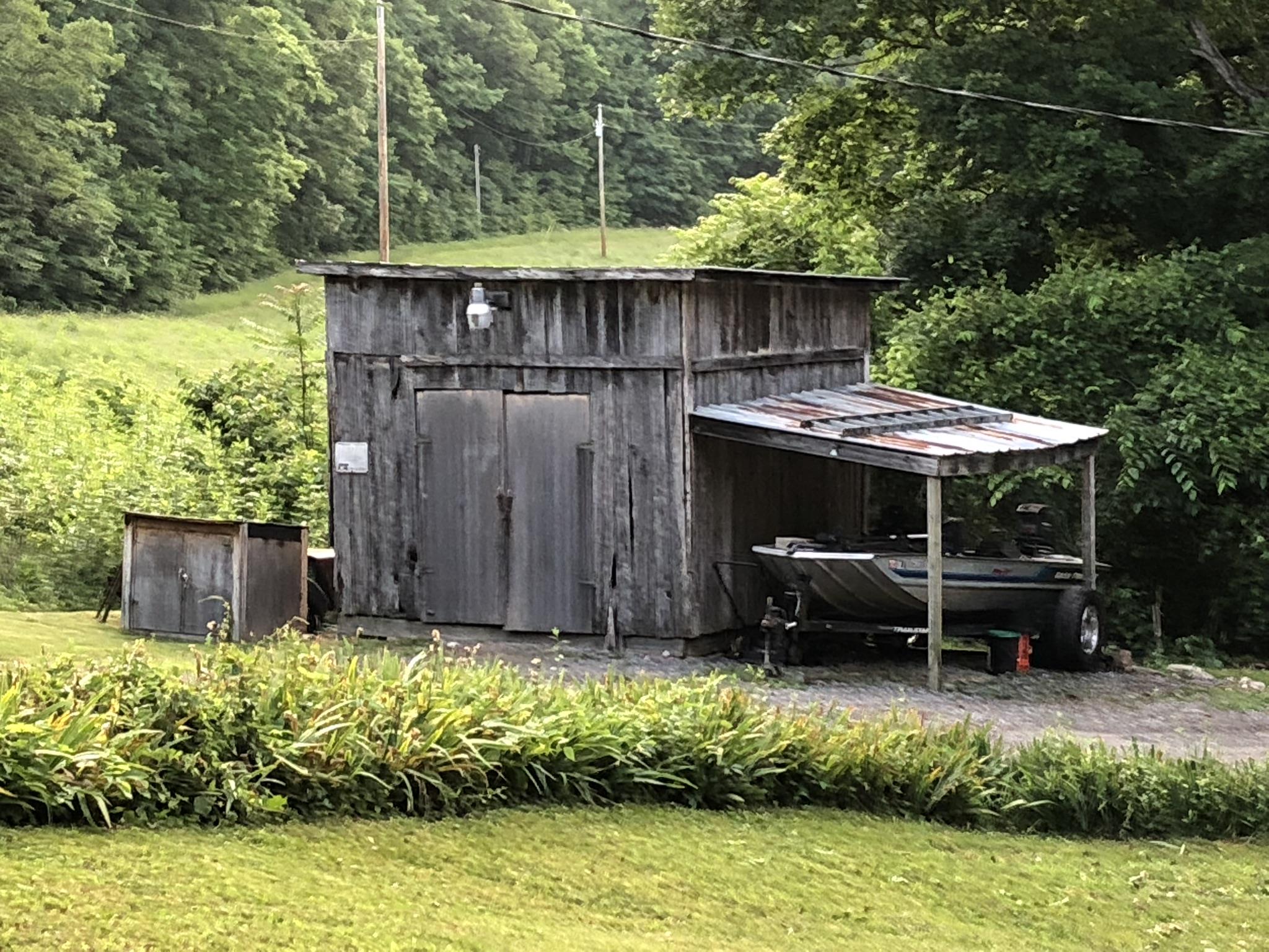 399 Brock Road Charlotte, TN 37036 - Photo 18 of 22 Great storage shed for whatever you need!